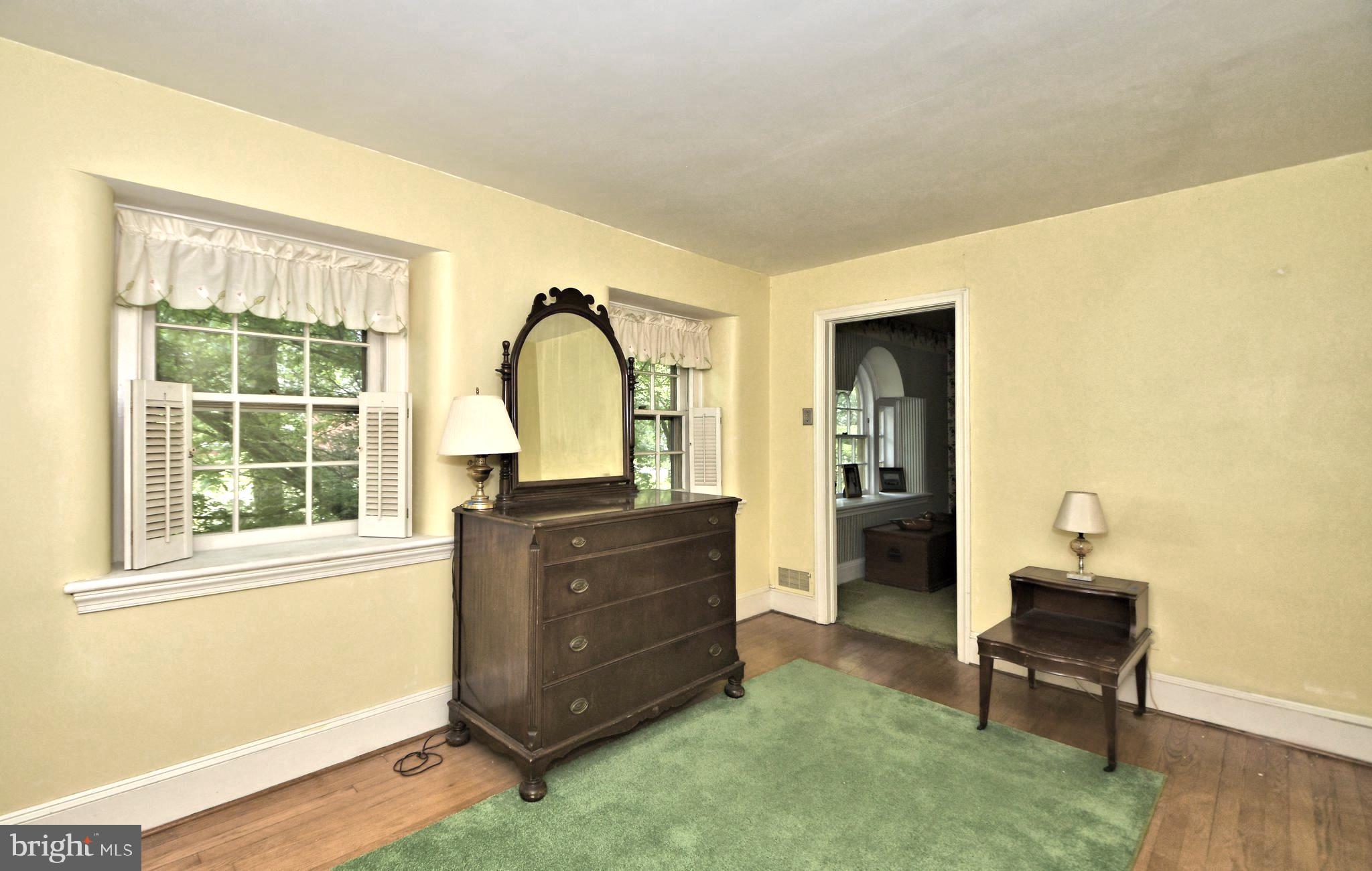 120 Hewett Road Wyncote, PA 19095 - Photo 22 of 44 a room with a dresser and a window