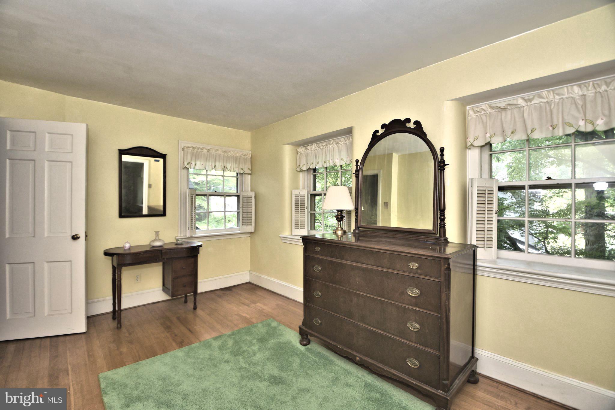 120 Hewett Road Wyncote, PA 19095 - Photo 24 of 44 a living room with furniture and a window