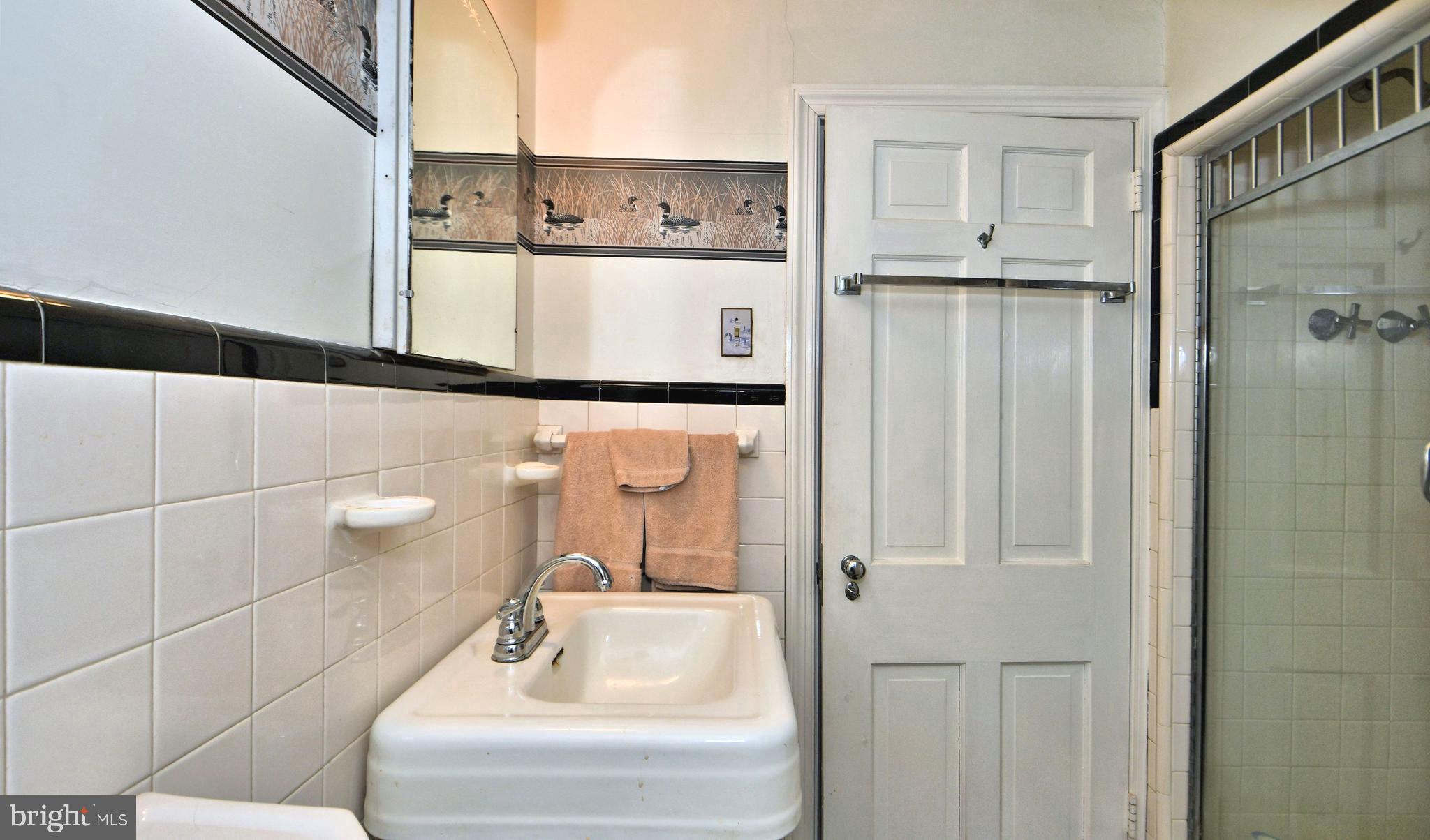 120 Hewett Road Wyncote, PA 19095 - Photo 25 of 44 a bathroom with a sink a toilet and shower