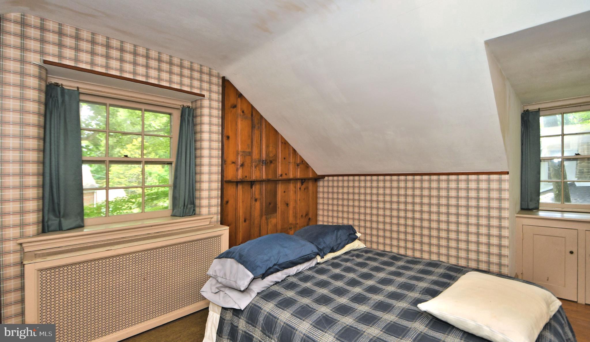 120 Hewett Road Wyncote, PA 19095 - Photo 26 of 44 a bedroom with a bed and a window