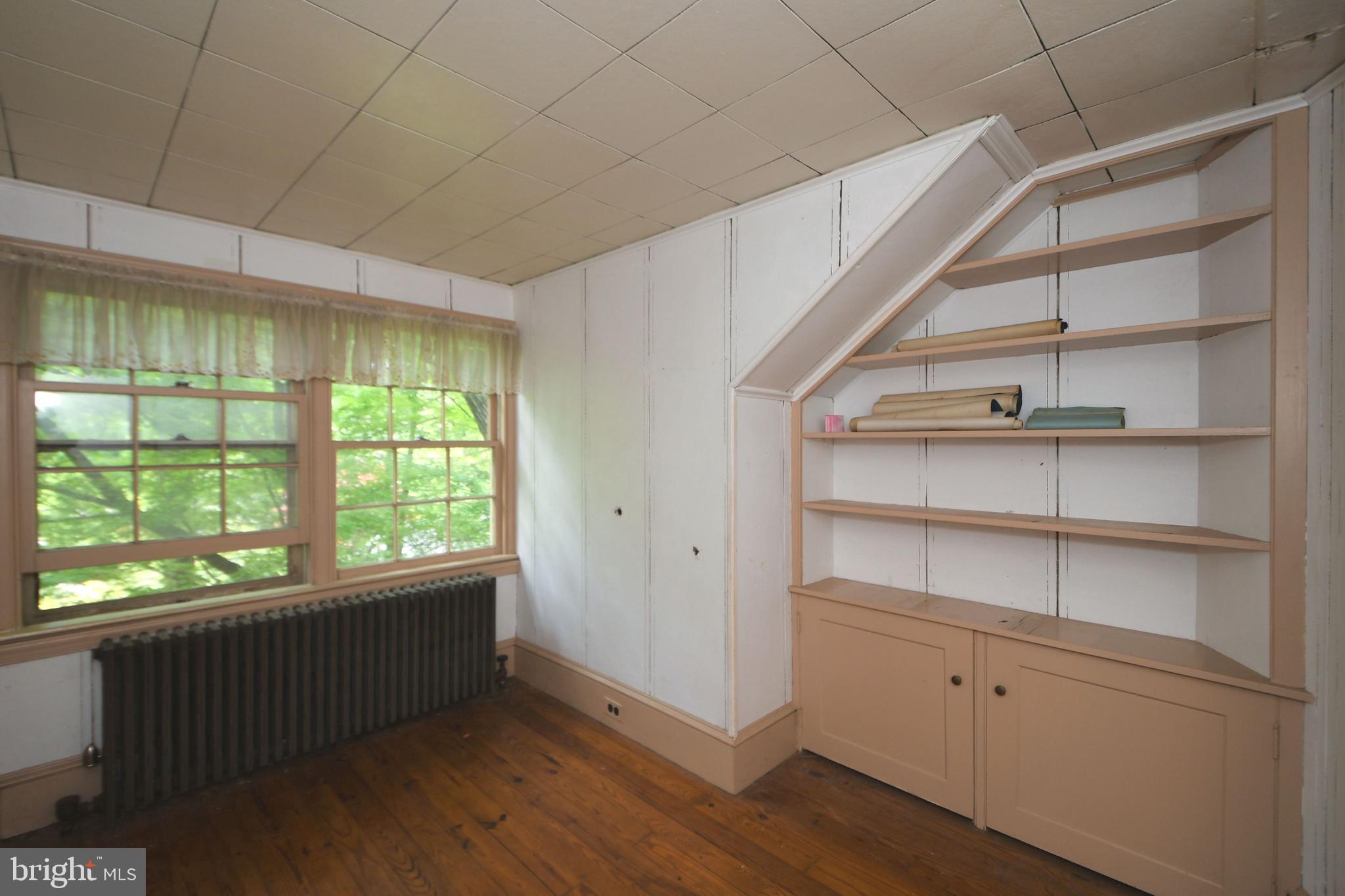 120 Hewett Road Wyncote, PA 19095 - Photo 29 of 44 a view of an empty room with a window