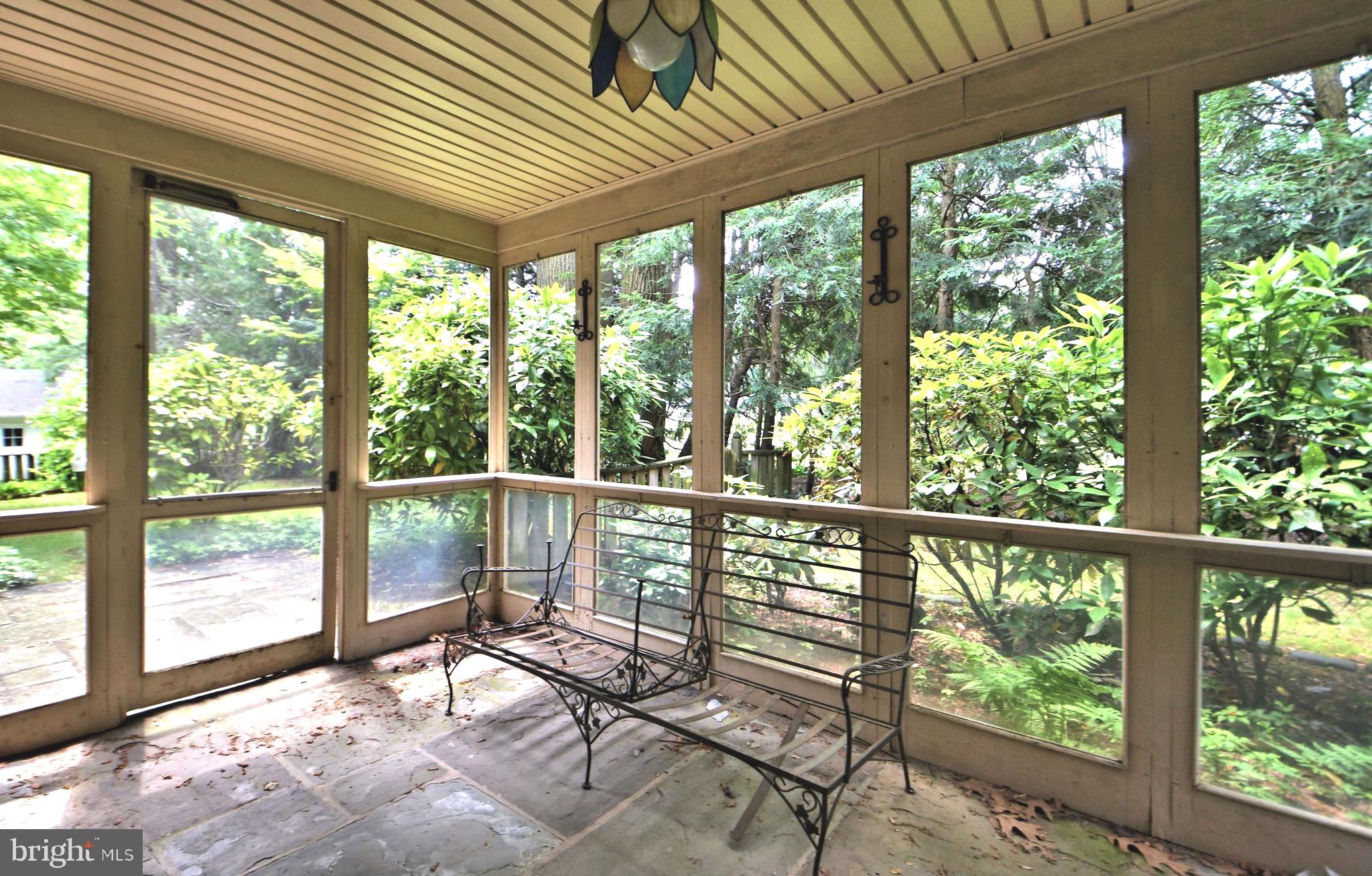 120 Hewett Road Wyncote, PA 19095 - Photo 38 of 44 a view of a porch with wooden floor and outdoor space