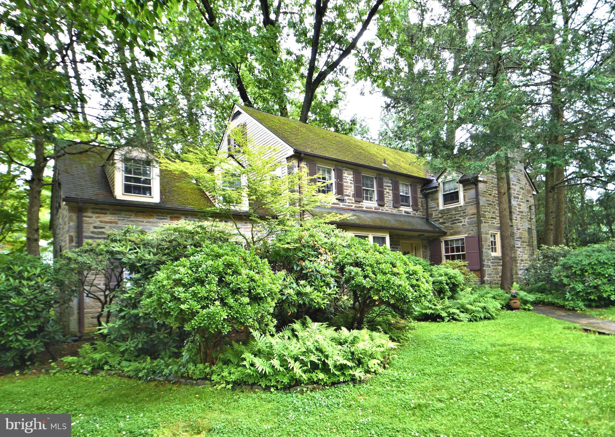 120 Hewett Road Wyncote, PA 19095 - Photo 41 of 44 front view of a house with a yard