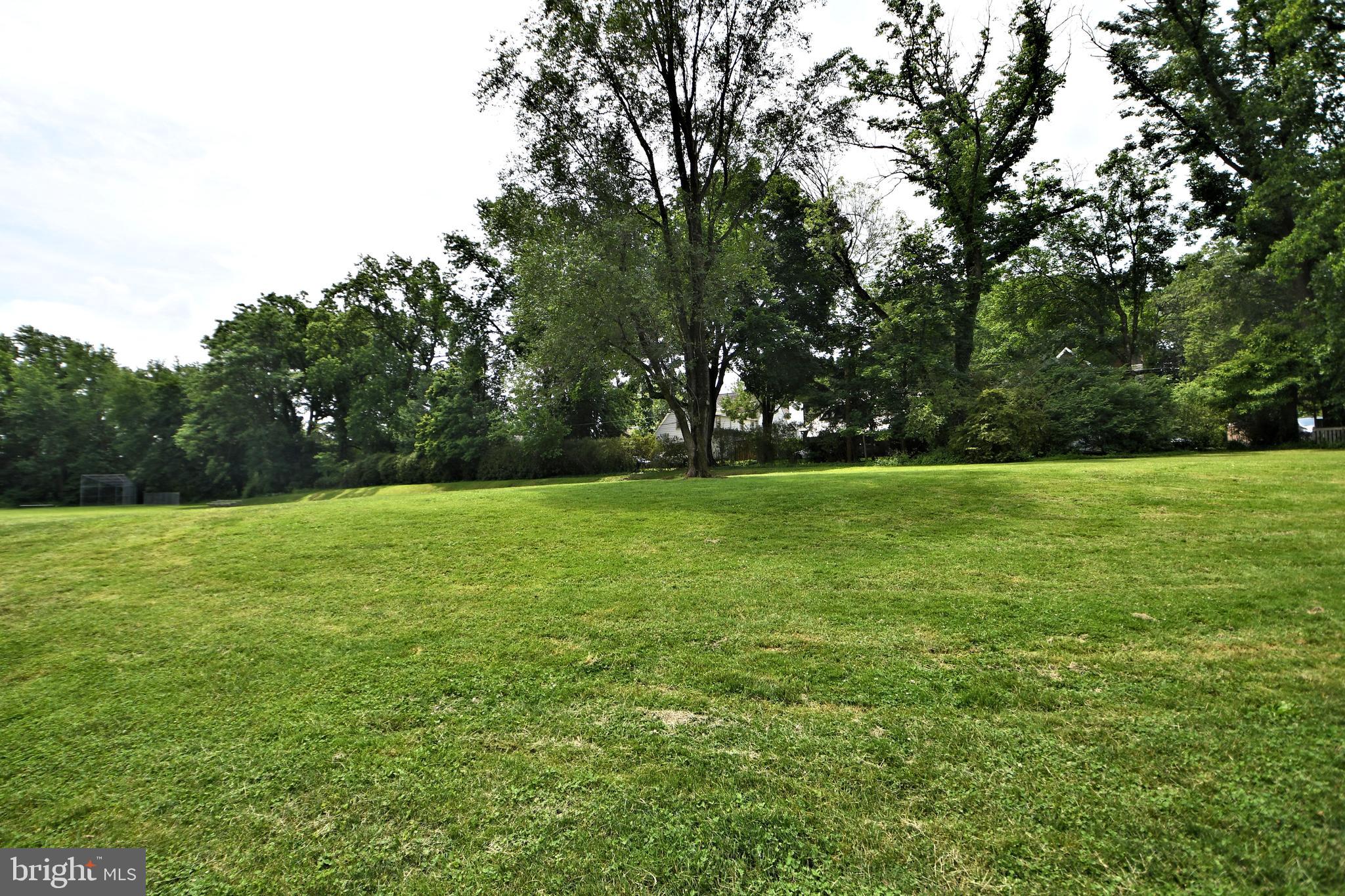 120 Hewett Road Wyncote, PA 19095 - Photo 42 of 44 a view of a field with trees in the background