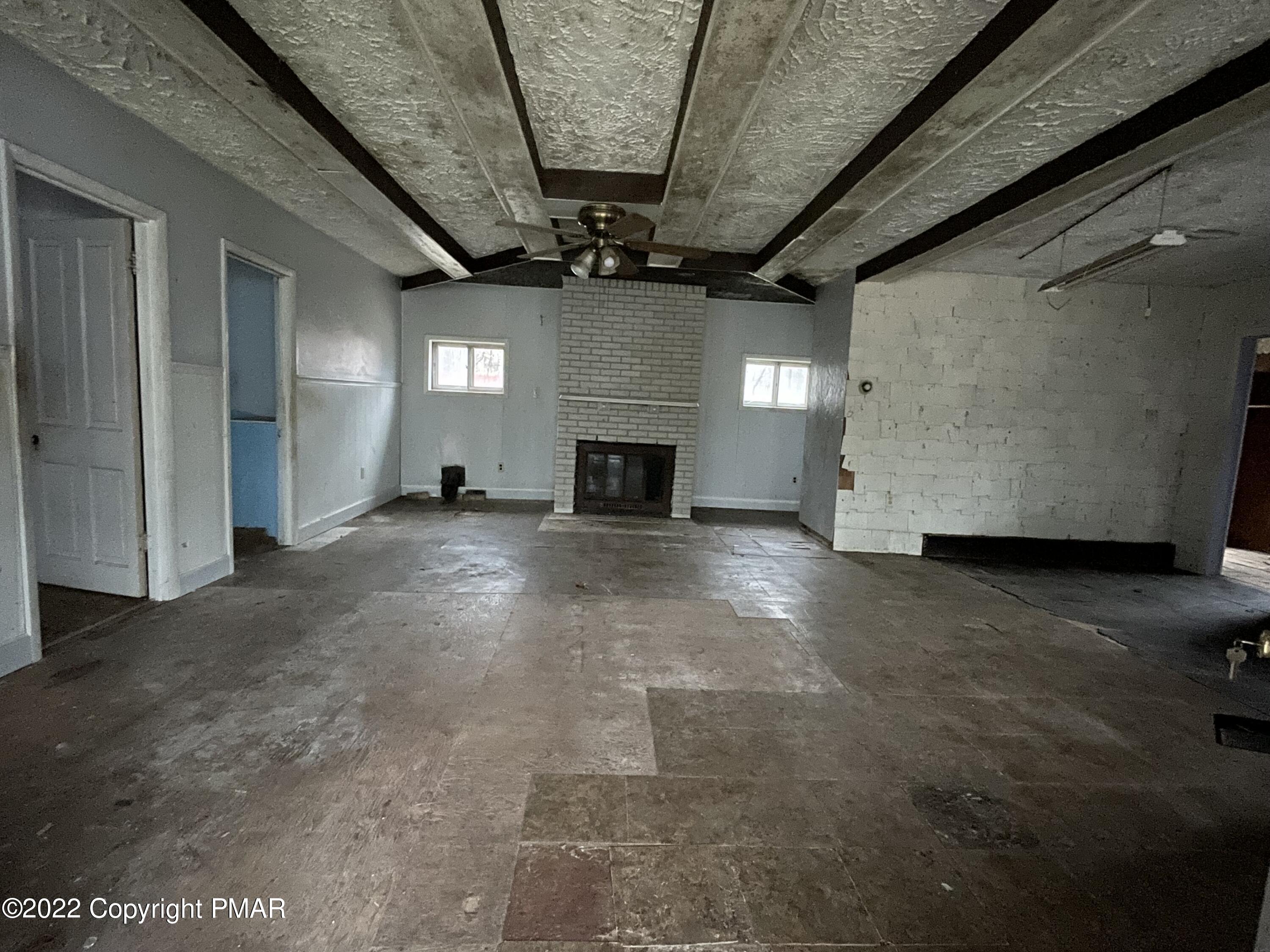 1907 Johns Road Effort, PA 18330 - Photo 2 of 5 a view of a livingroom with an empty space