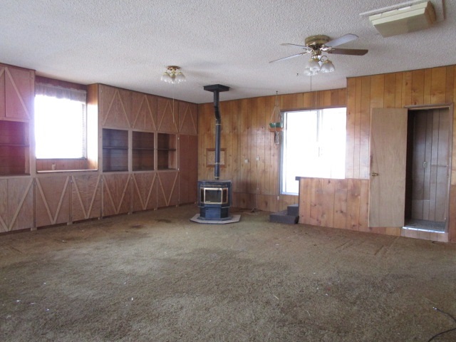1054-19 19 1/2 Road Fruita, CO 81521 - Photo 2 of 24 a view of an empty room with a window