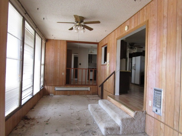 1054-19 19 1/2 Road Fruita, CO 81521 - Photo 3 of 24 a view of a hallway with a chandelier
