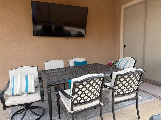 a view of a terrace with chairs