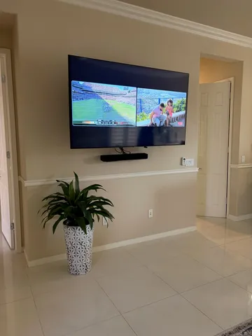 a flower pot with a potted plant