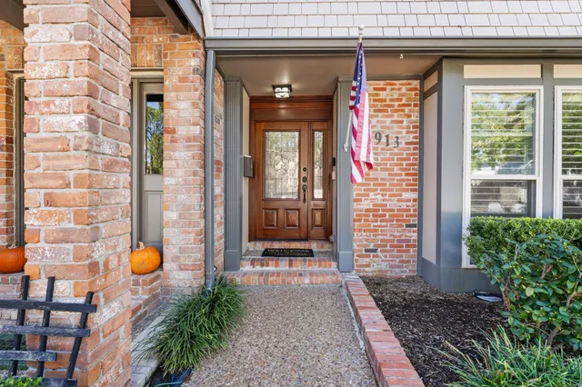 a front view of a house with a porch