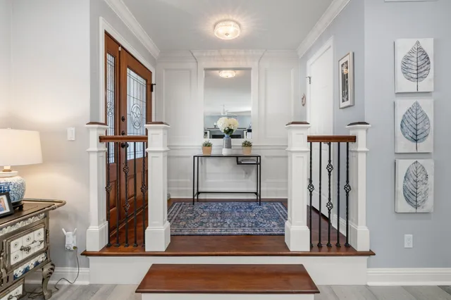 a living room with furniture and a rug