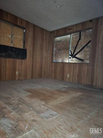 a view of outdoor space with wooden floor