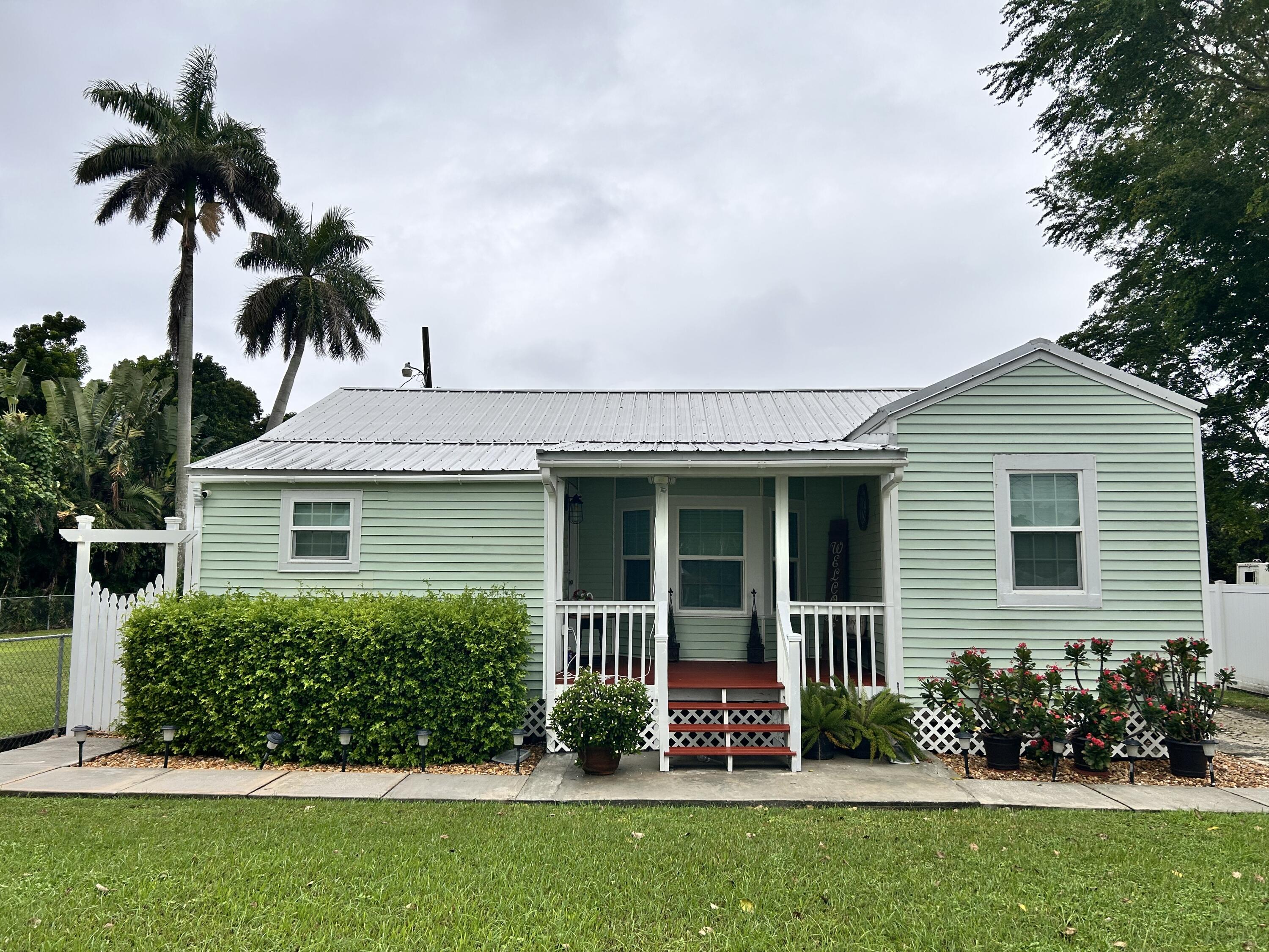 1931 Bacom Point Road Pahokee, FL 33476 - Photo 1 of 26 Exterior Front