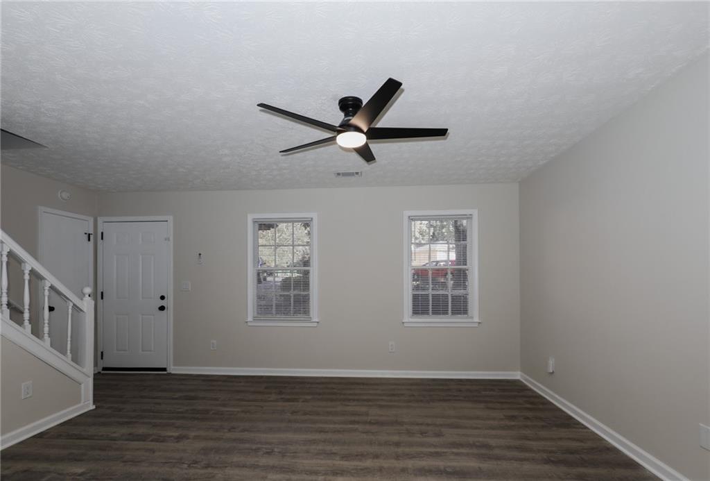 5343 Ridgemere Court Stone Mountain, GA 30083 - Photo 4 of 20 a view of an empty room with a window