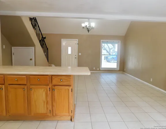 a bathroom with a sink a mirror and a vanity