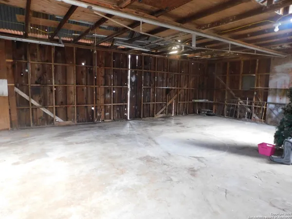 a view of a room with wooden racks