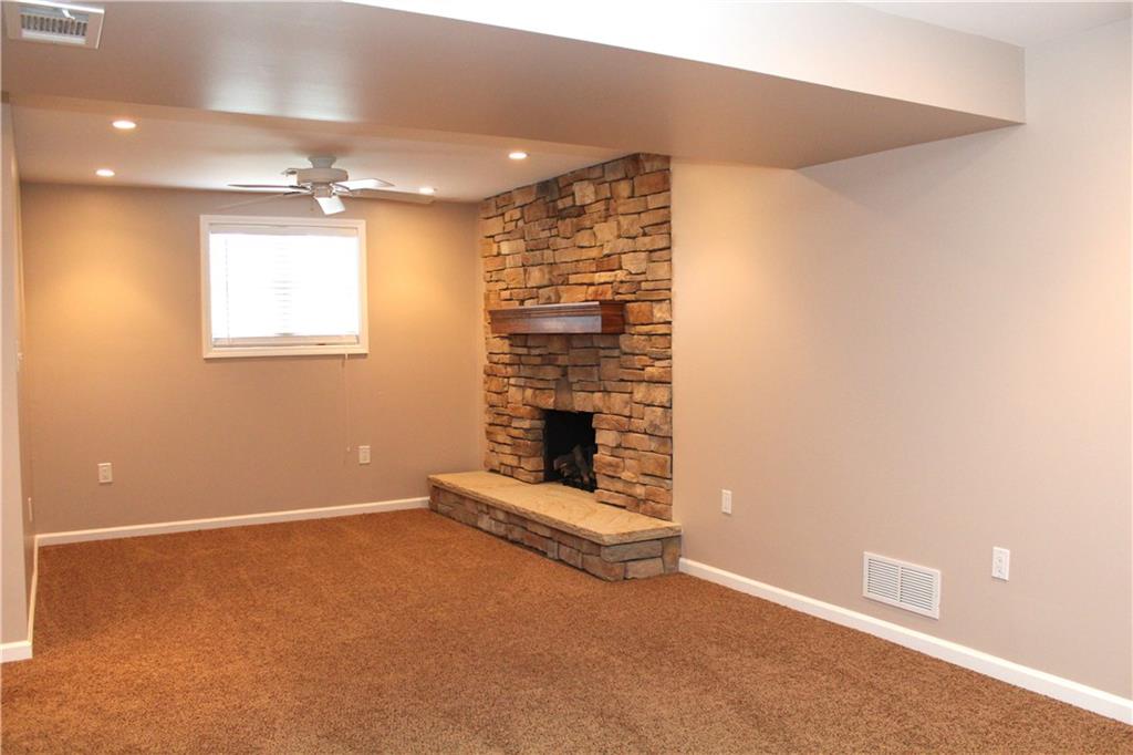 558 Partridge Run Road Gibsonia, PA 15044 - Photo 15 of 24 Large game room with newer carpeting and recessed lighting.