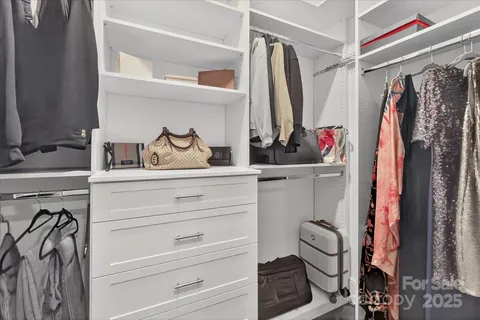 a bathroom with a bathtub and a sink