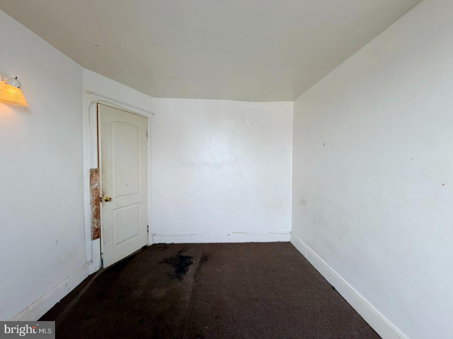 3420 Lyndale Avenue Baltimore, MD 21213 - Photo 12 of 24 a view of an empty room and wooden floor