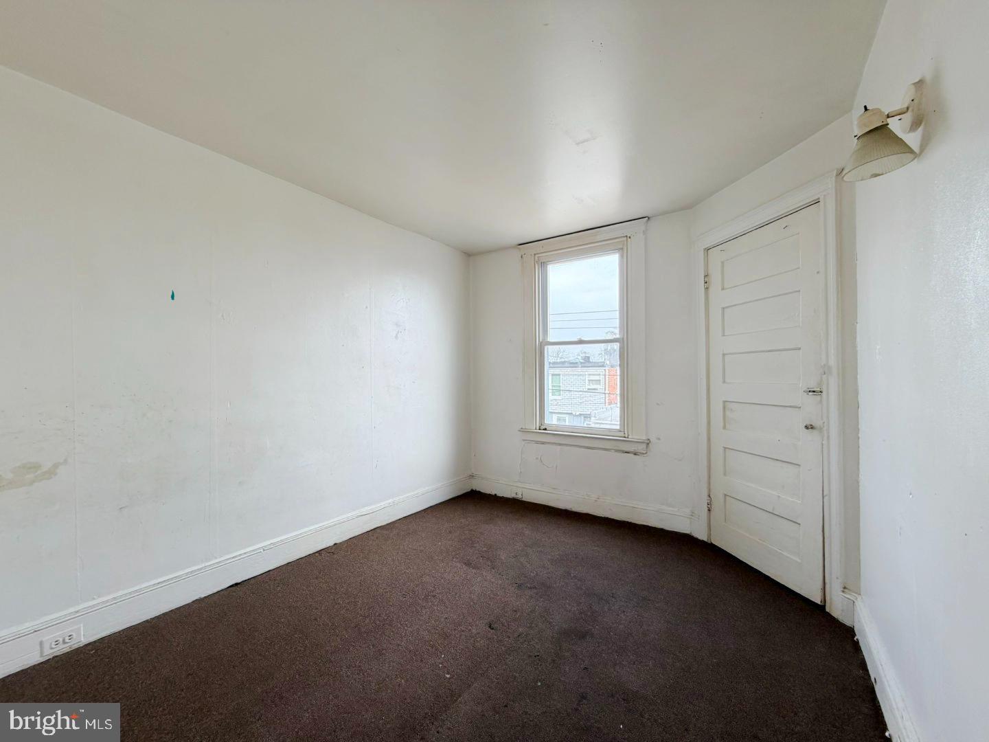 3420 Lyndale Avenue Baltimore, MD 21213 - Photo 13 of 24 an empty room with a window
