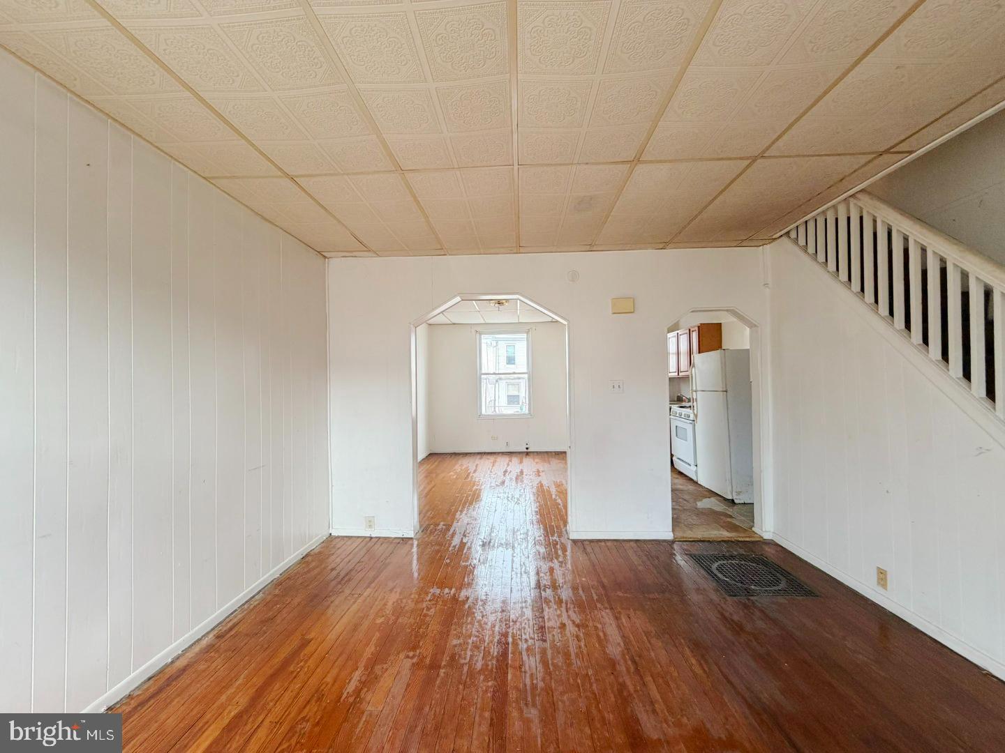 3420 Lyndale Avenue Baltimore, MD 21213 - Photo 3 of 24 a view of empty room with wooden floor