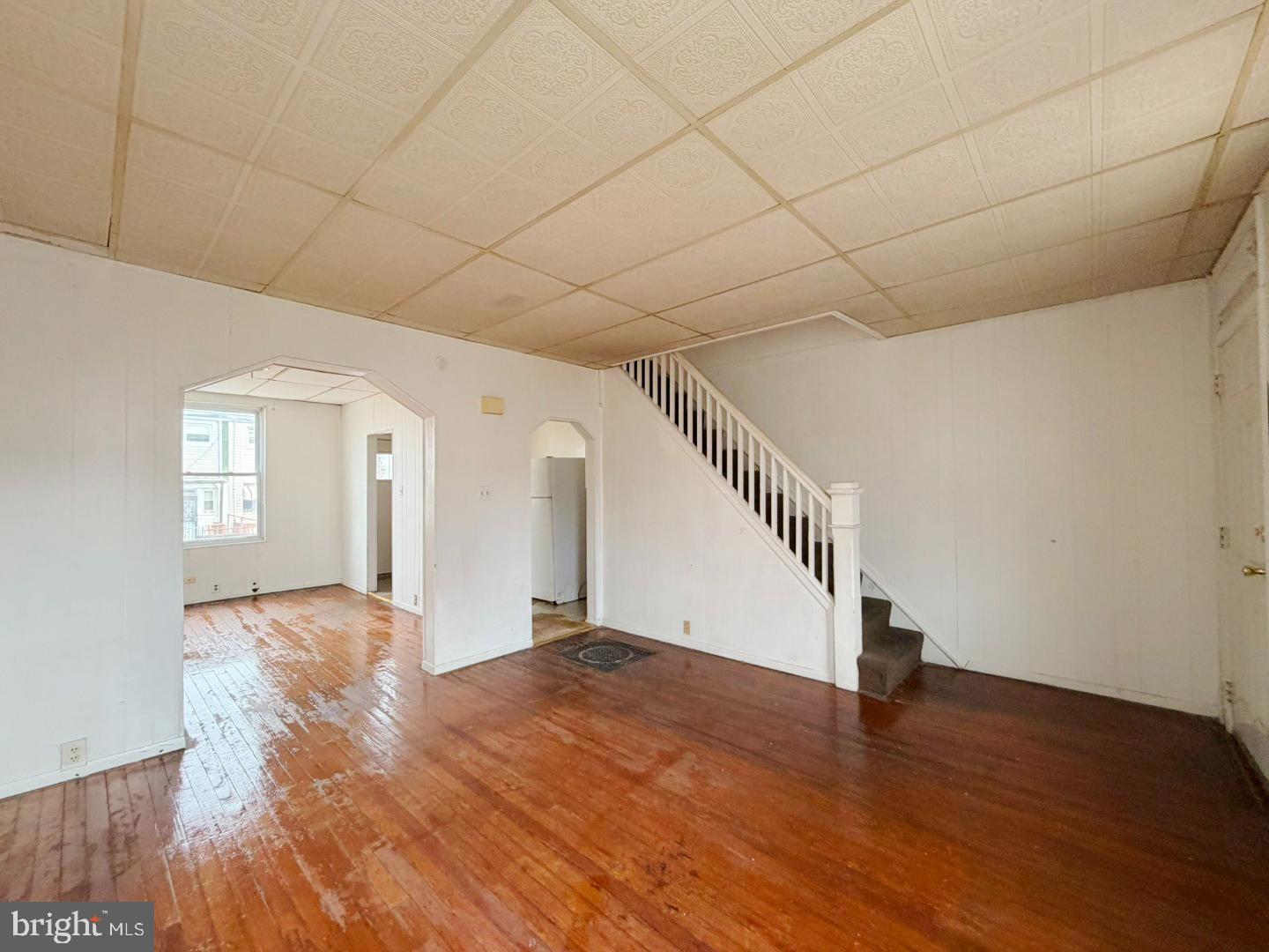3420 Lyndale Avenue Baltimore, MD 21213 - Photo 4 of 24 a view of empty room with wooden floor