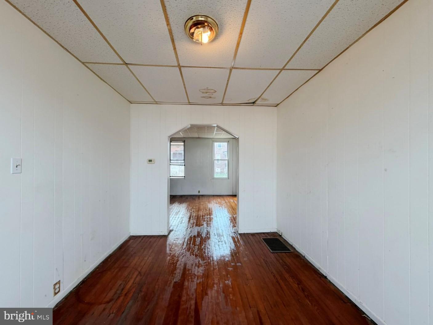 3420 Lyndale Avenue Baltimore, MD 21213 - Photo 6 of 24 a view of empty room with wooden floor
