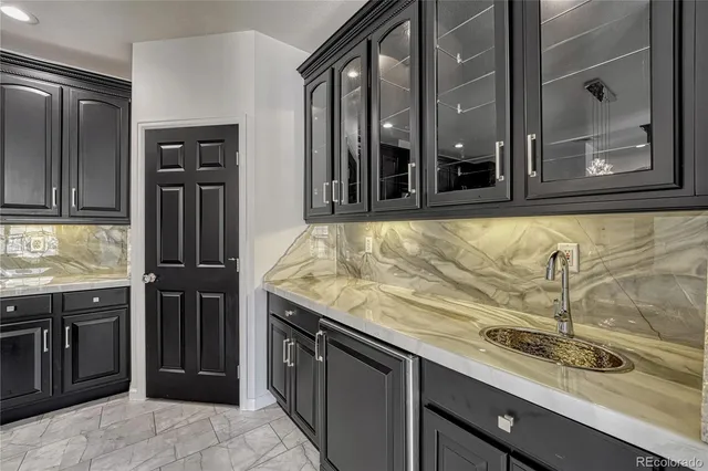 a view of open kitchen cabinet and oven