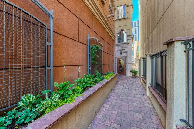 a view of a pathway with a building in the background