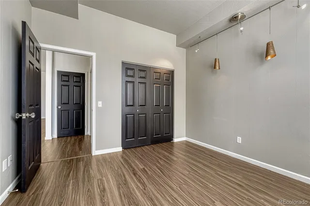 a view of a storage and utility room with washer and dryer