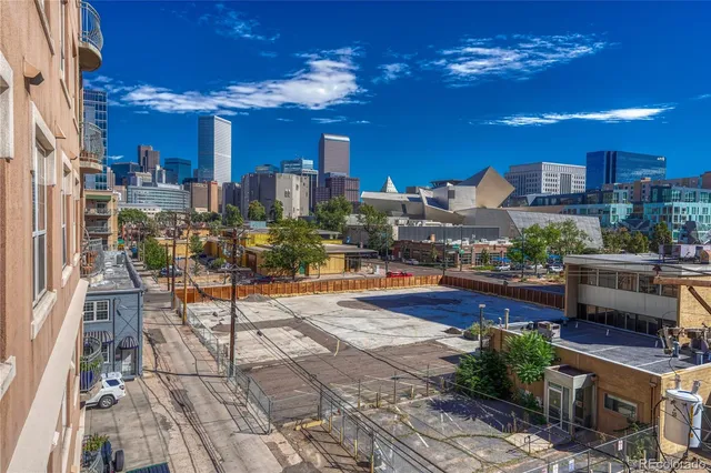 a view of balcony with furniture