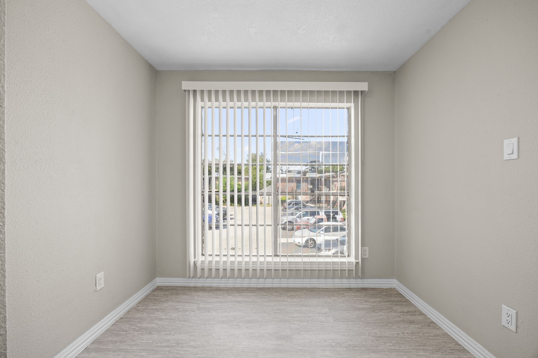 9616 Long Point Road, Unit 54 Houston, TX 77055 - Photo 11 of 18 a view of an empty room with a window