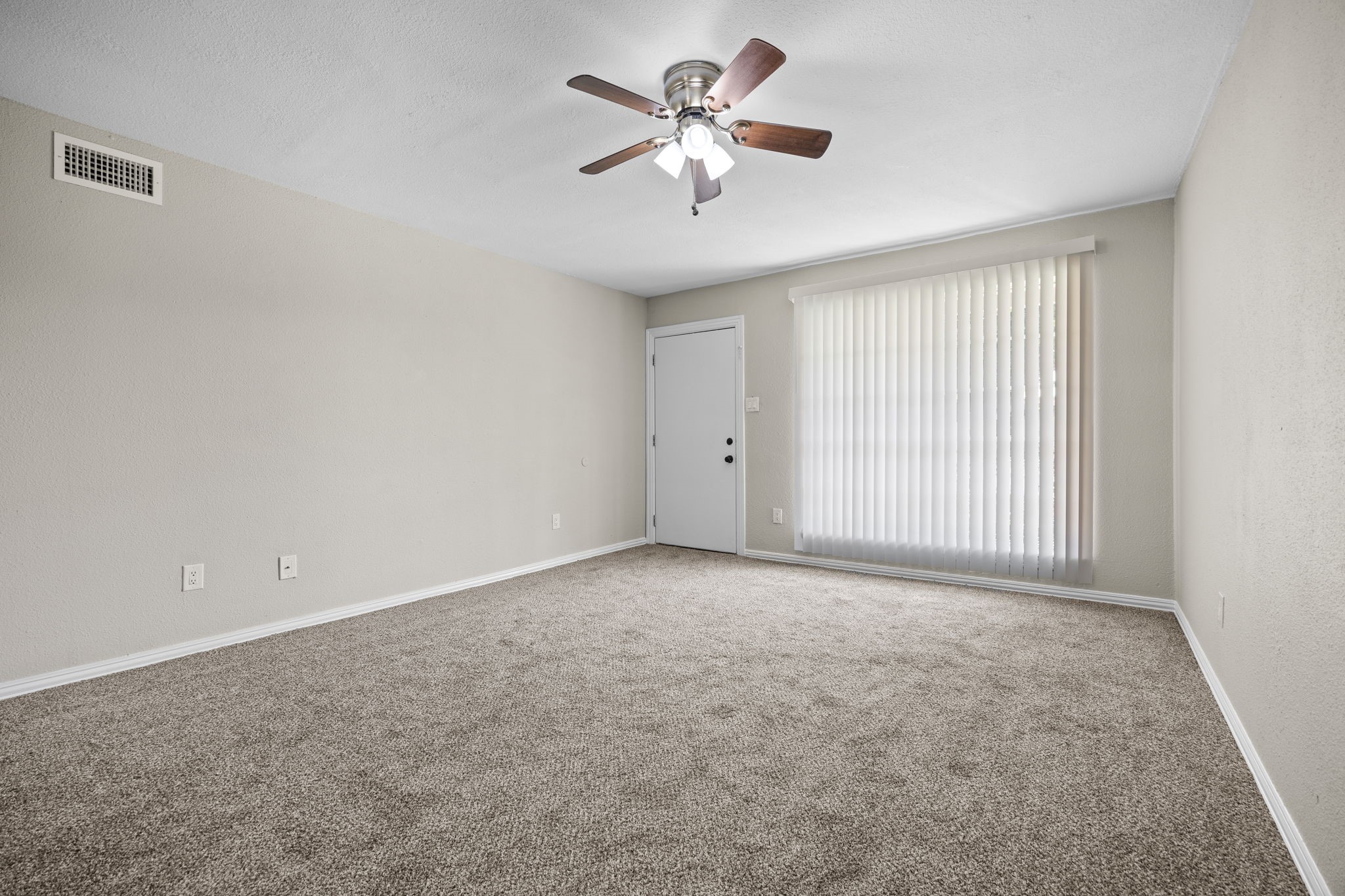 9616 Long Point Road, Unit 54 Houston, TX 77055 - Photo 6 of 18 a view of an empty room with a window
