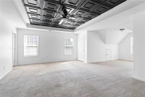 a view of a room with windows