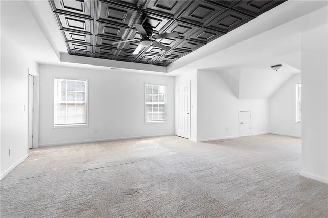 a view of a room with windows