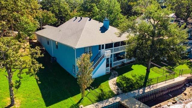 6209 Point La Vista Road Malakoff, TX 75148 - Photo 28 of 38 a view of a house with a backyard and garden