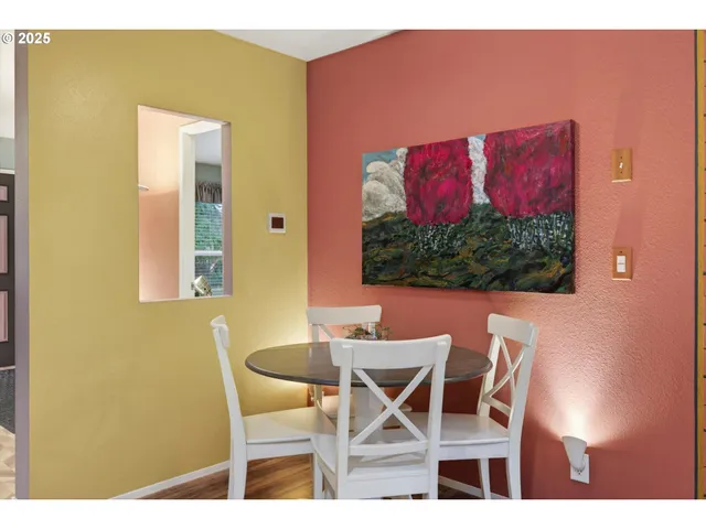 a view of a bedroom with washer and dryer