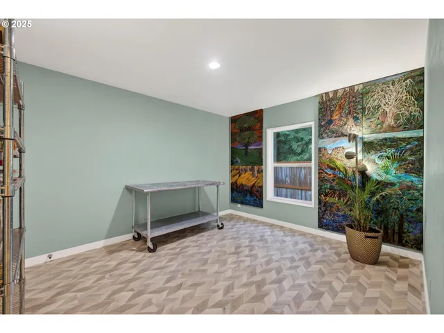 a view of a house with backyard sitting area and garden