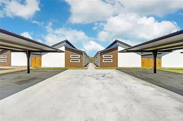 a view of outdoor space and front view of a house
