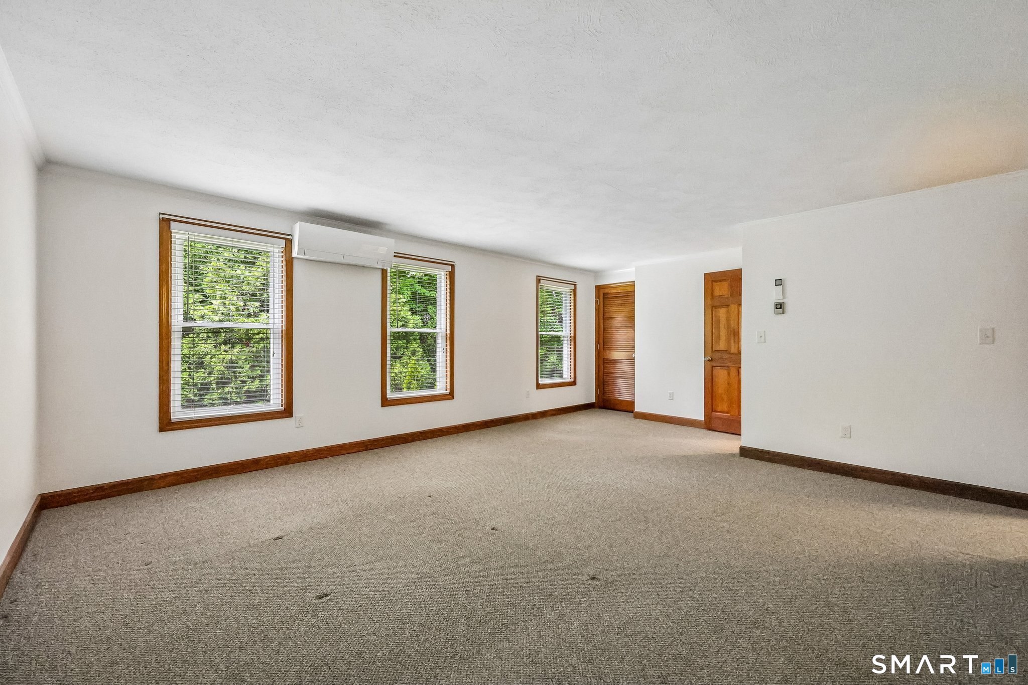 65 Old Route 79, Unit 5 Madison, CT 06443 - Photo 19 of 28 A row of three windows will bring light into this room
