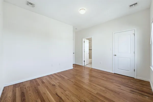 a view of an empty walk in closet