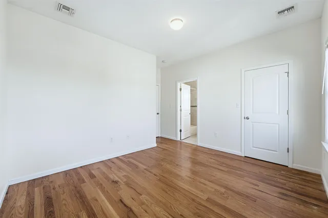 a view of an empty walk in closet