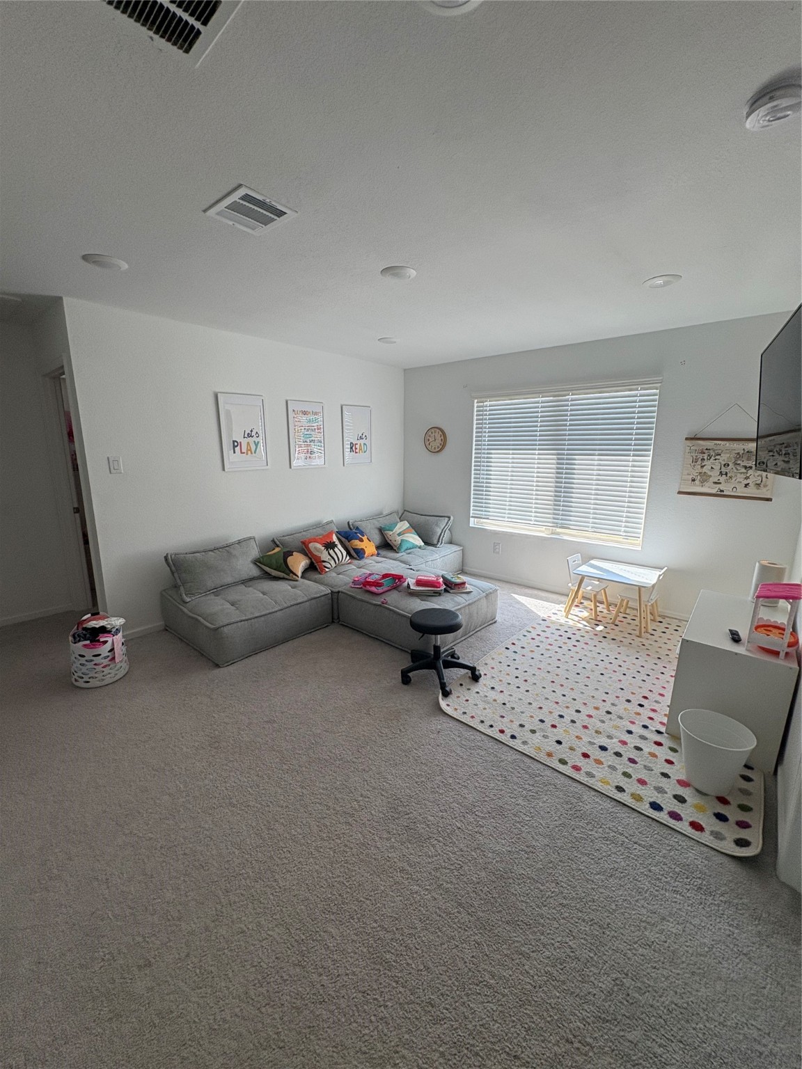 3703 Windy Brook Road Rosenberg, TX 77469 - Photo 14 of 22 a living room with furniture a air conditioner vent and a window