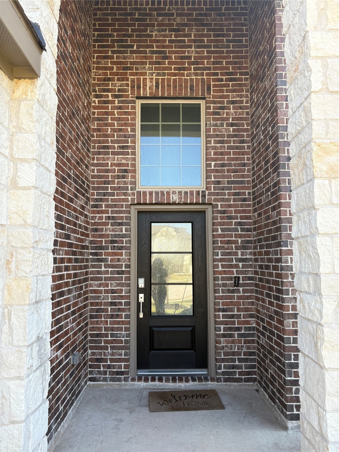 3703 Windy Brook Road Rosenberg, TX 77469 - Photo 2 of 22 a view of a door with brick walls