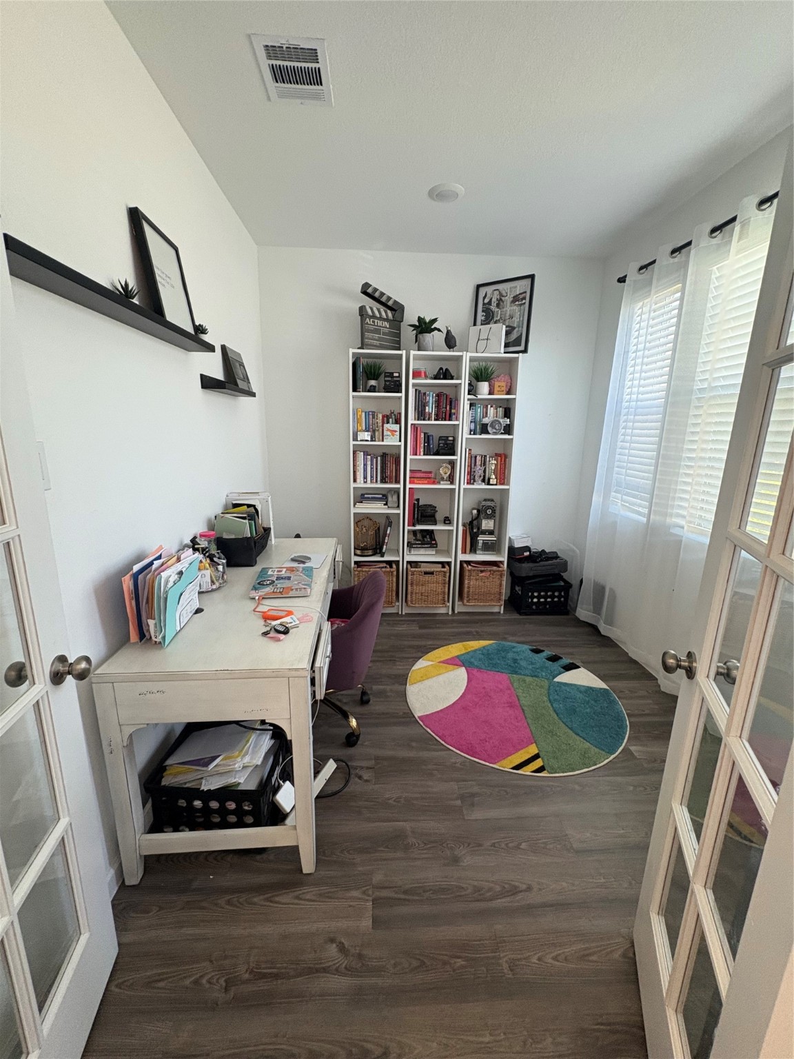 3703 Windy Brook Road Rosenberg, TX 77469 - Photo 4 of 22 a bedroom with a bed and wooden floor