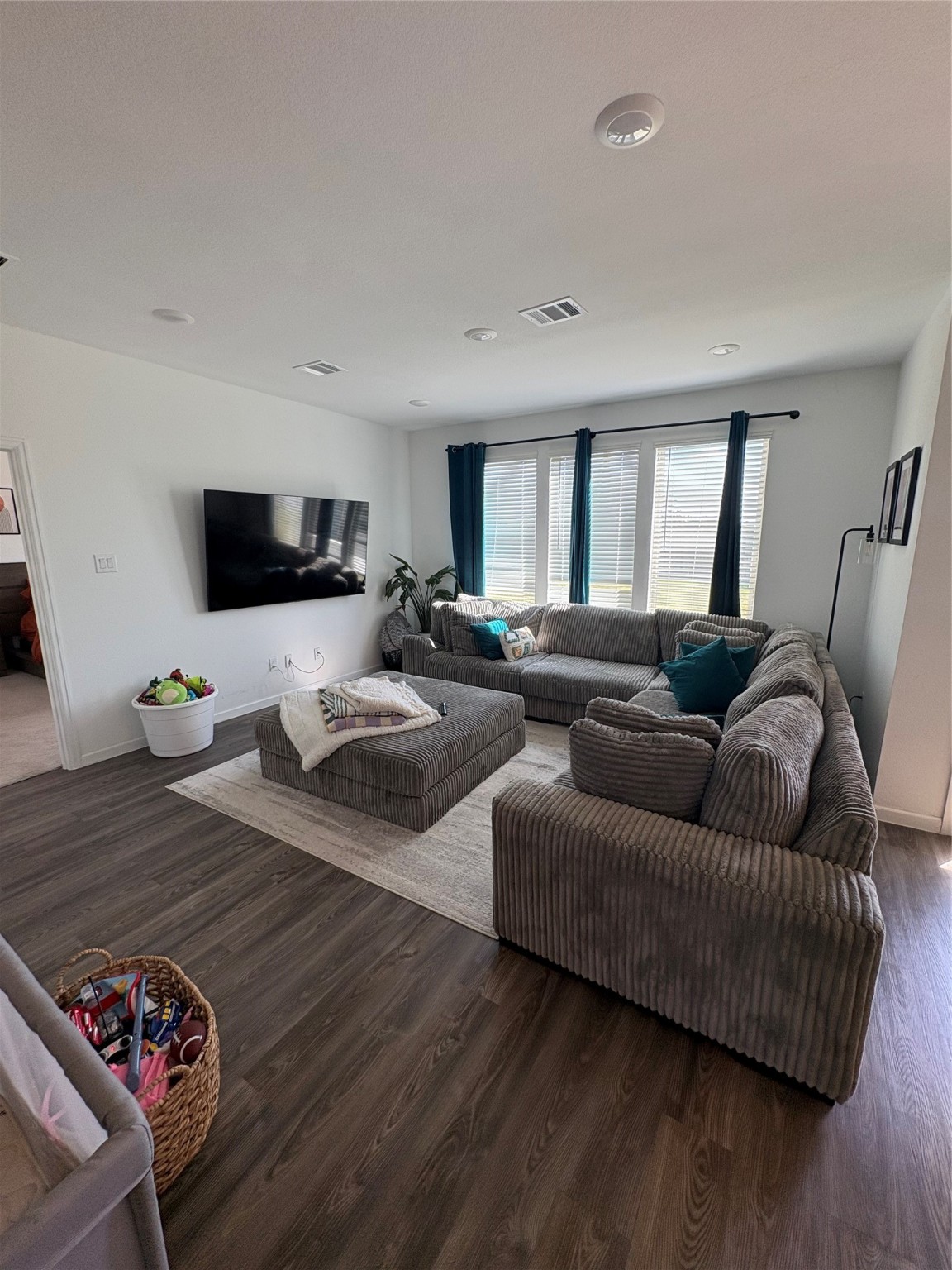 3703 Windy Brook Road Rosenberg, TX 77469 - Photo 10 of 22 a living room with furniture flat screen tv and a window