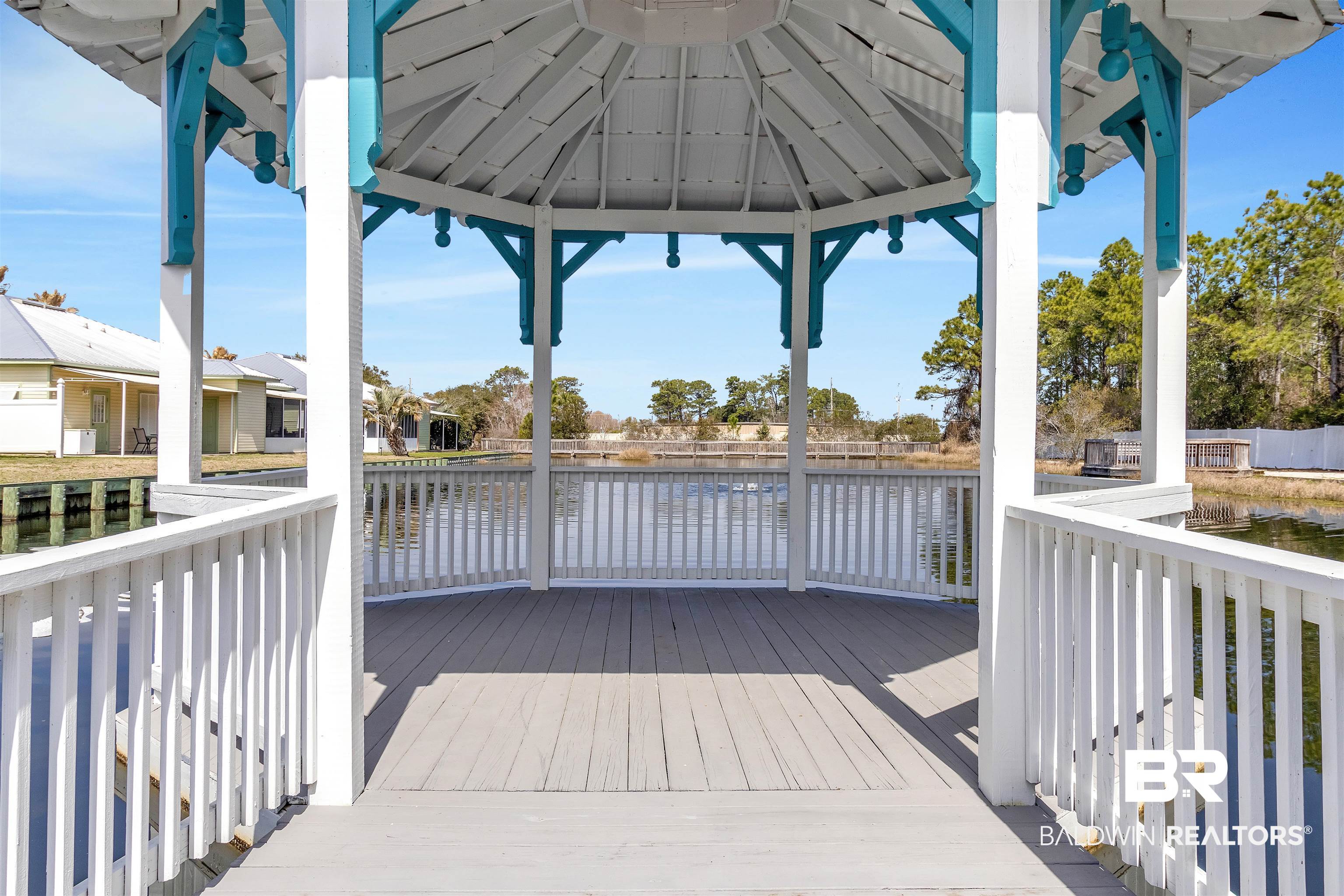 4324 B Lindsey Lane, Unit 4324B Orange Beach, AL 36561 - Photo 19 of 33 Wooden terrace with a water view
