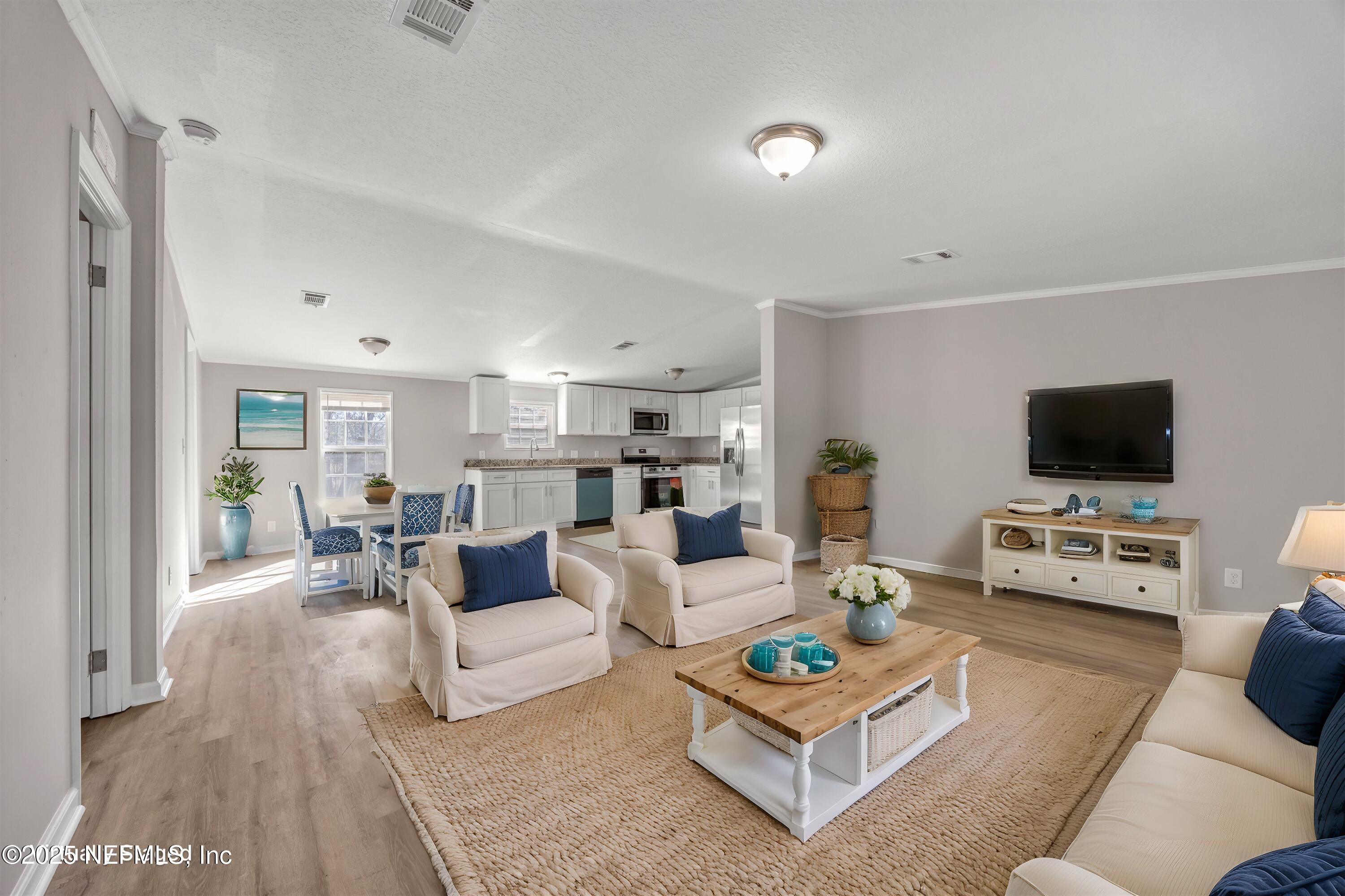 1131 Mulberry Landing Road Hilliard, FL 32046 - Photo 5 of 33 05-C_R50210 - Living Room - Coastal - 0