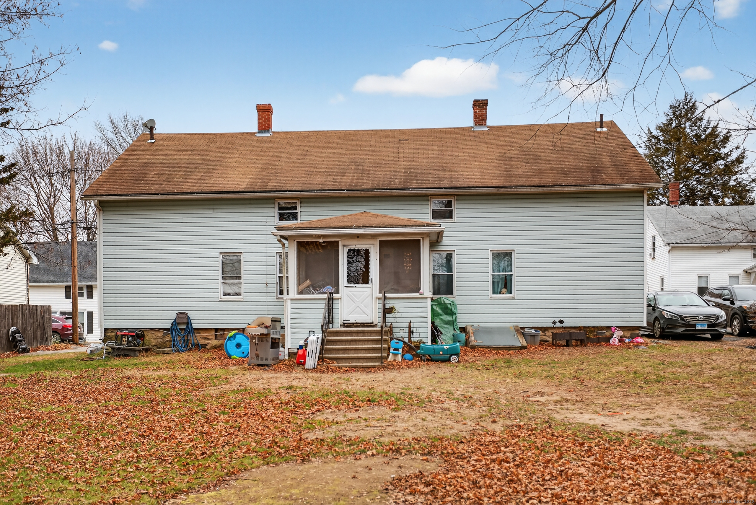 29 Church Street Killingly, CT 06241 - Photo 13 of 27 a backyard of a house with barbeque oven table and chairs