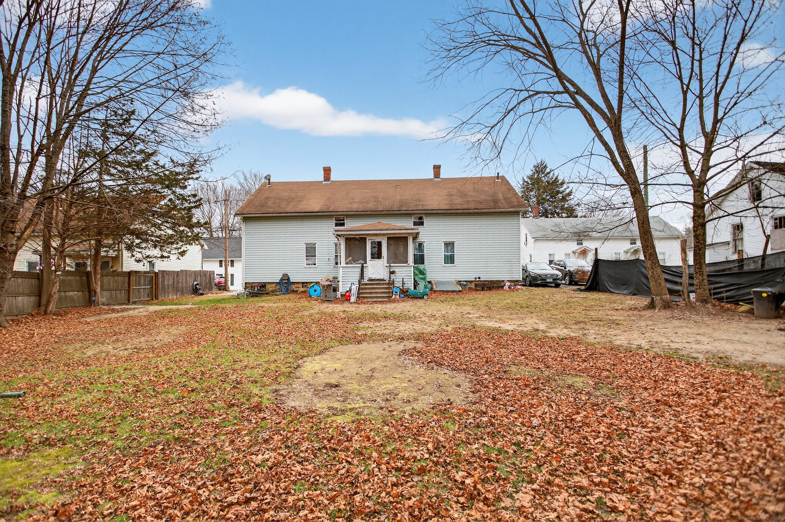 29 Church Street Killingly, CT 06241 - Photo 14 of 27 a view of a house with a yard covered in snow